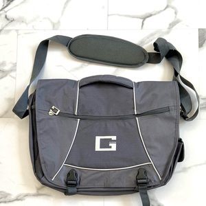 New GUESS laptop luggage. Padded on both sides of bag for laptop protection.